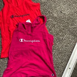 two champion shirts, worn once